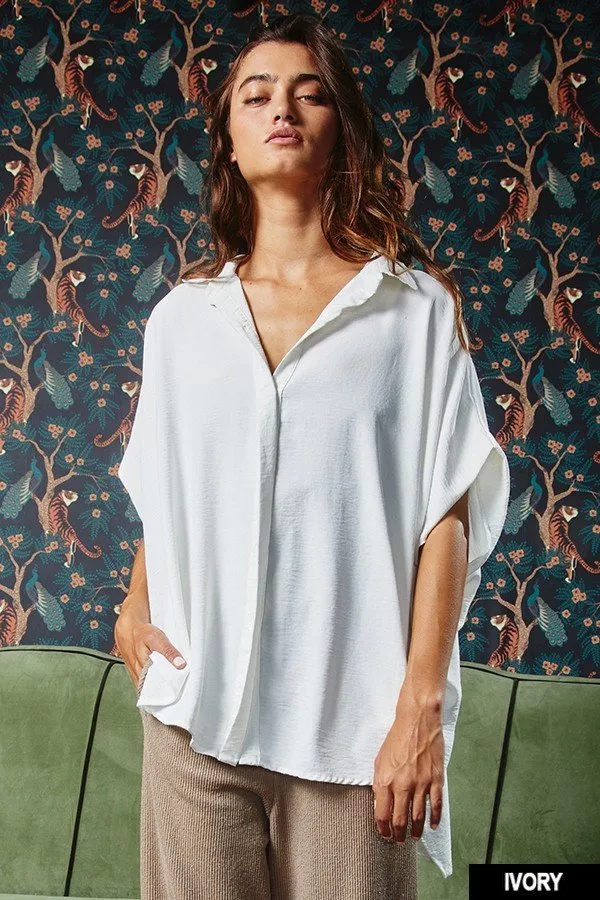 Drapey dolman sleeve high low button up oversized blouse